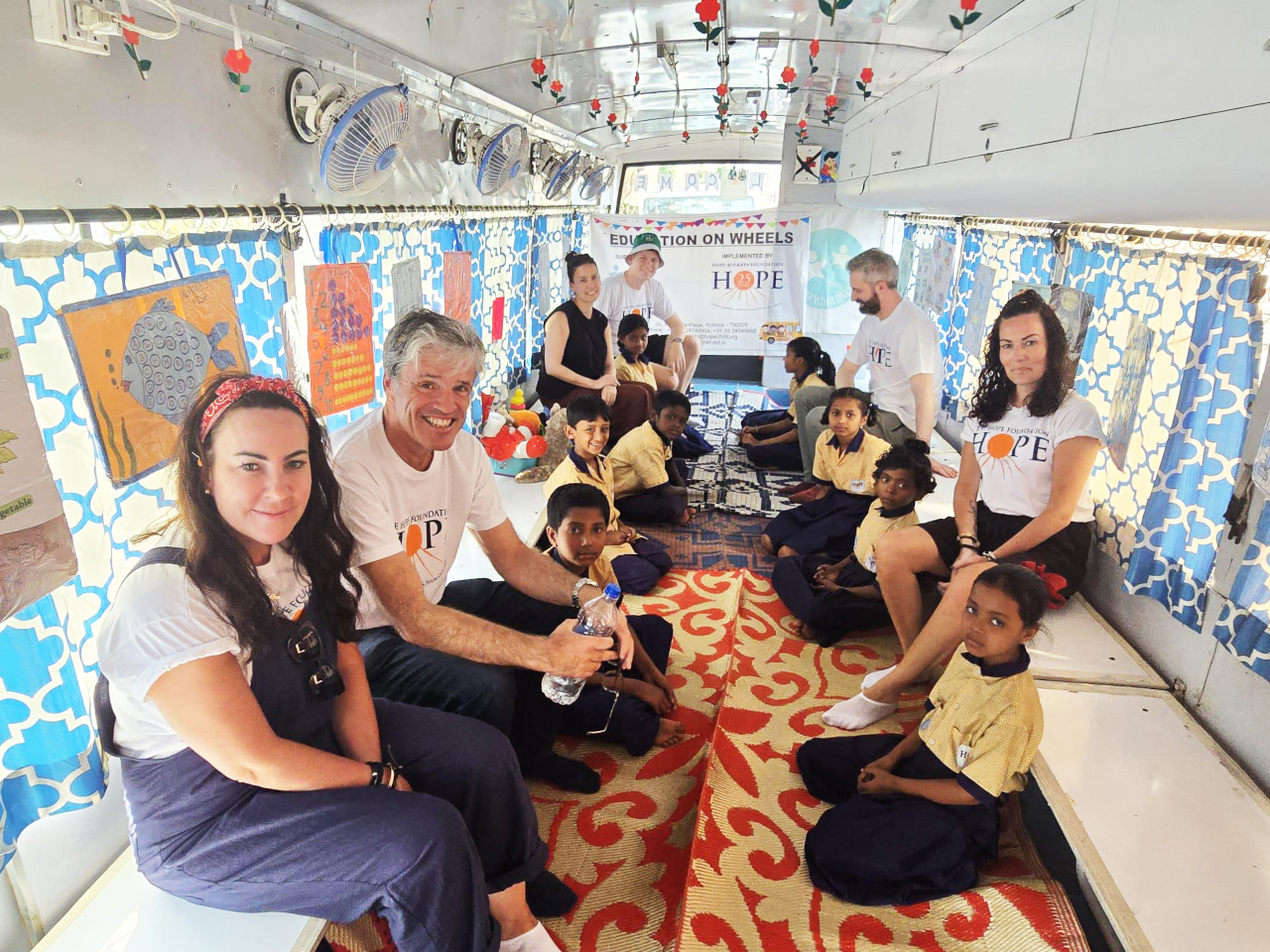 President Eamon Harrington
travelled to Kolkata with a
Law Society team to witness
first-hand how funds from
the annual Calcutta Run
are being spent. The HOPE
Foundation’s ‘Education
on Wheels’ bus travels to
slum communities, giving
children access to primary
education Eamon Harrington with Law Society staff visiting Kolkata